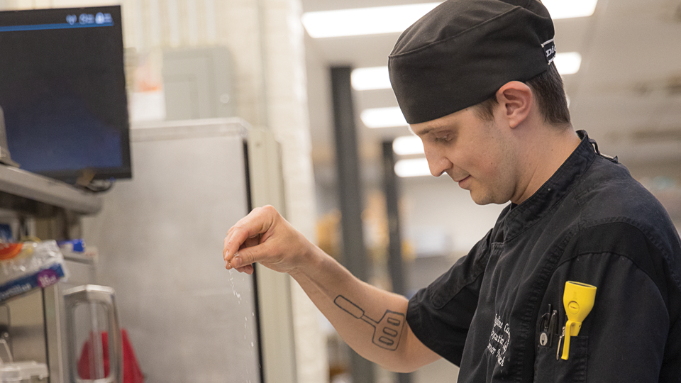 Connor Murdoch (above and far left) has the freedom to be creative in the Bucyrus Club kitchen.