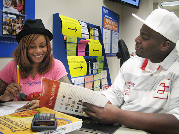 student and tutor in tutoring lab