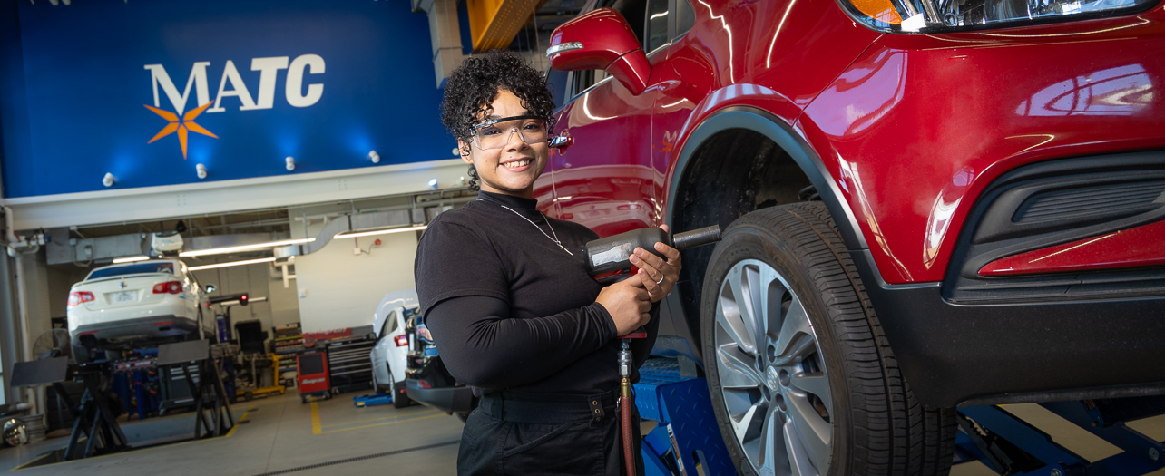 Samantha Albert - scholarship student in auto shop