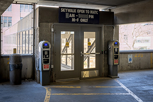 Paystation at entrance of bridge to M building