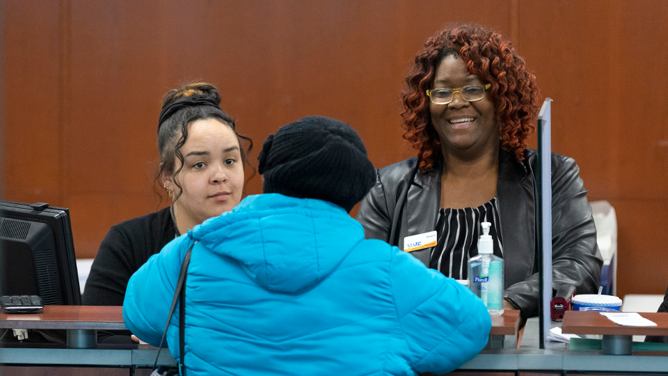 student getting help at the Downtown Milwaukee Campus Welcome Center