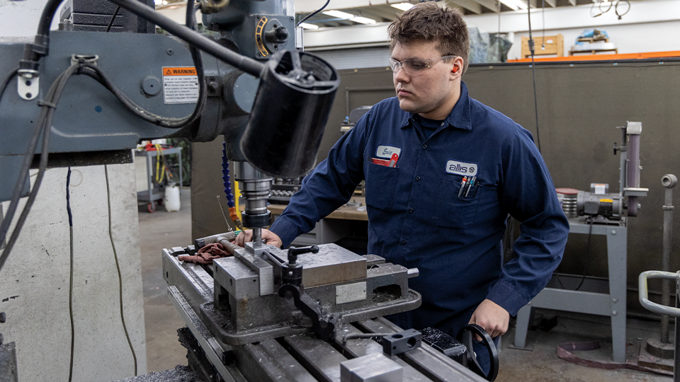 Eric Gama works in the shop