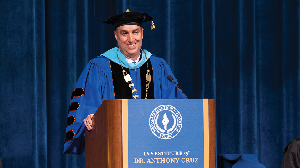 Dr. Anthony Cruz giving a speech