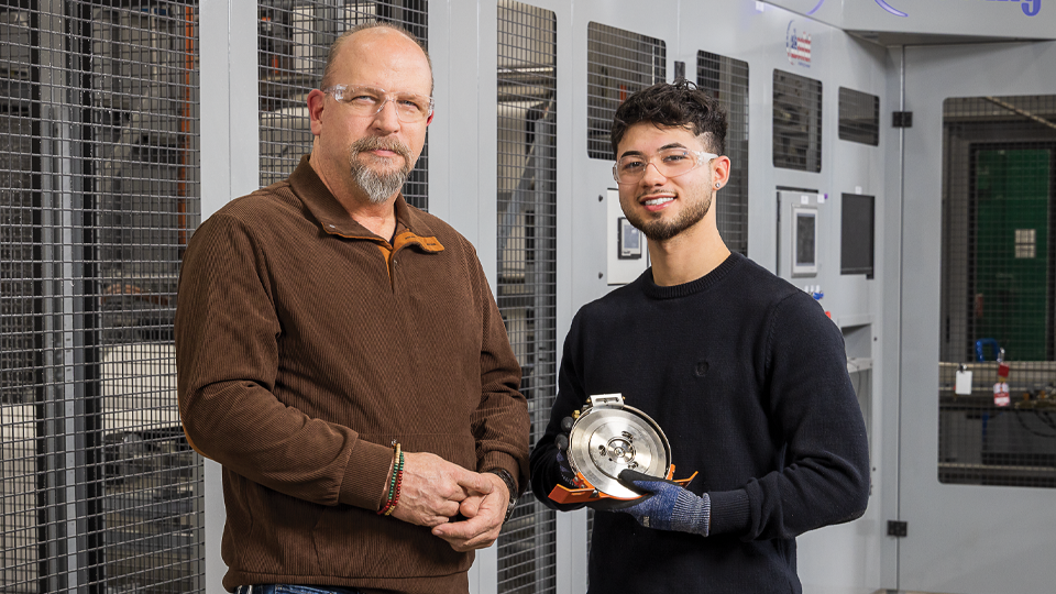 Student and teacher taking a picture