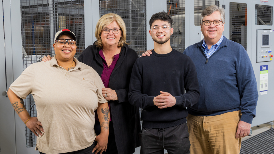 Students and employees take picture