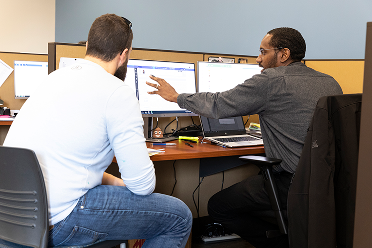 MATC Pathway Advisor Erik Riley with student in office pic