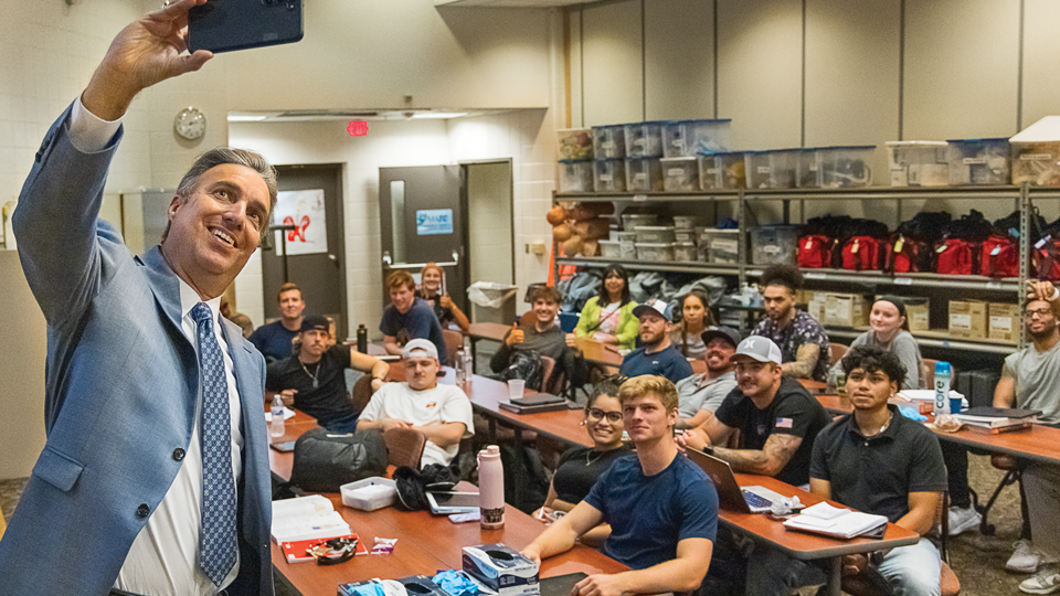 During the Coffee with Cruz events, he energized the crowd, took selfies with students, explained his students-first philosophy and poured coffee for each attendee. Above: