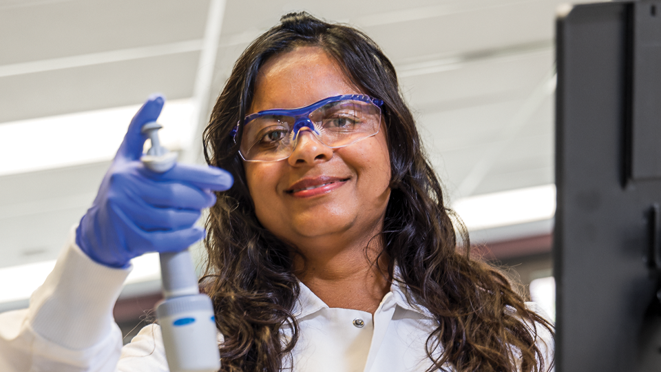 Heena Dhyani tests a water sample in her lab at MMSD.