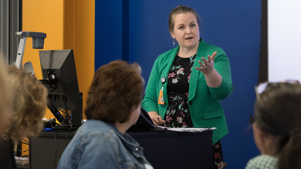 Woman teaching students how to be leaders