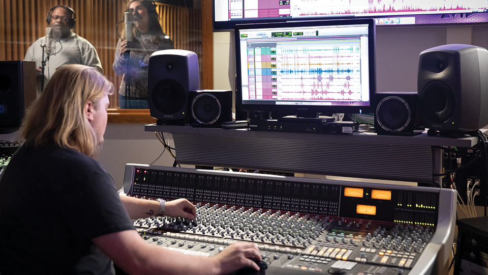 people with their producing equipment